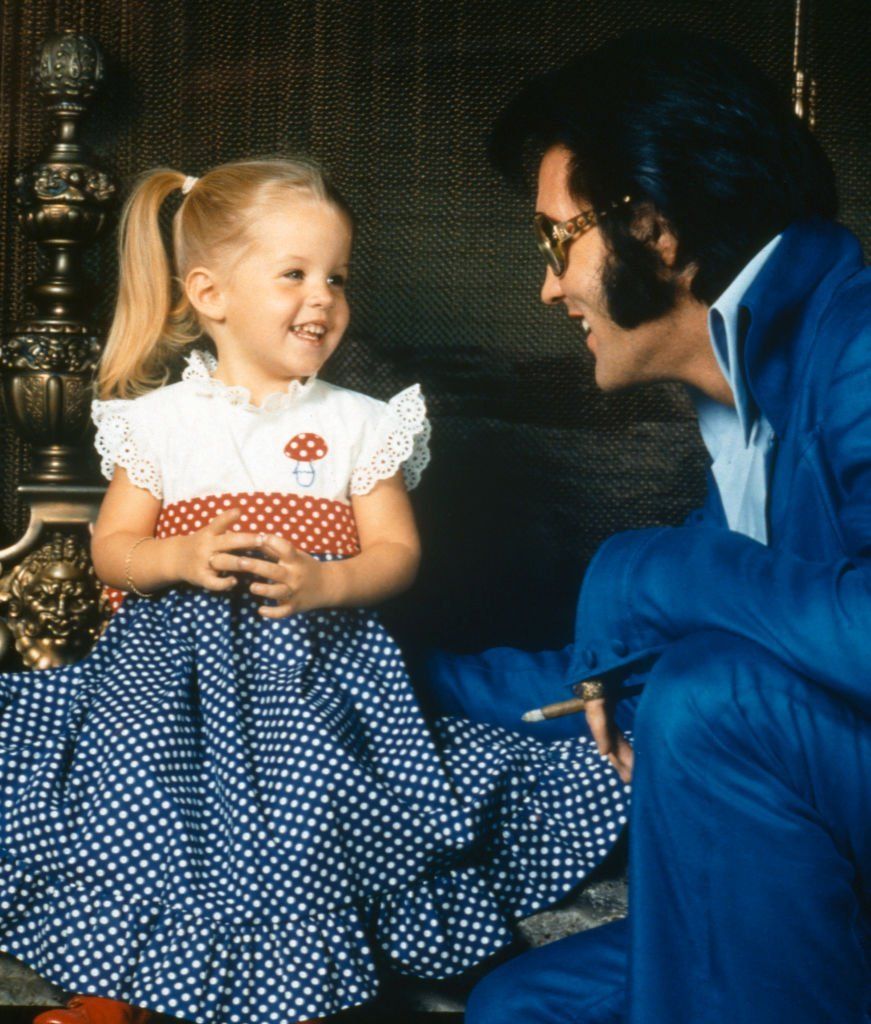 A young Lisa Marie with her father Elvis.