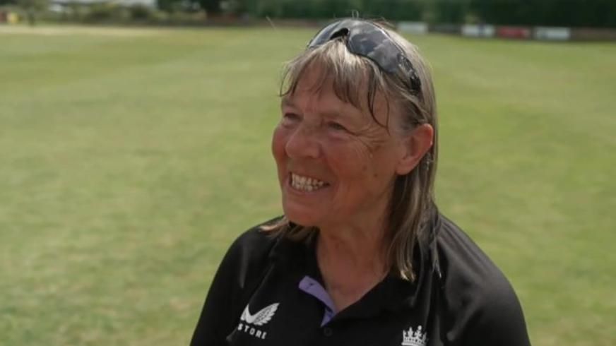 Jane Powell on a cricket field