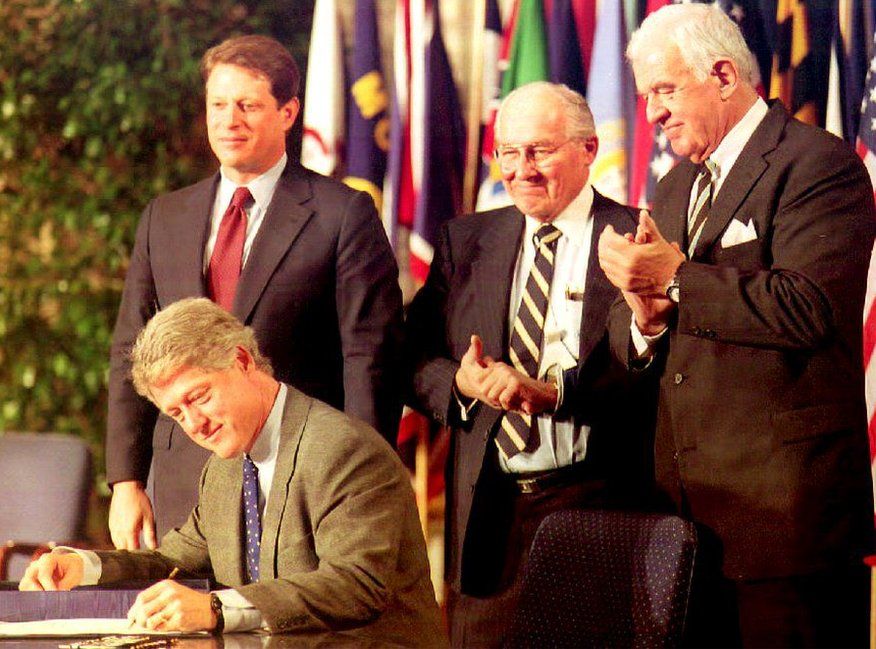 President Bill Clinton signing NAFTA in 1994