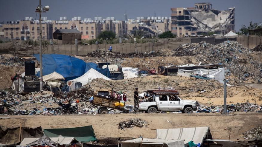 palestinians set up tents next to sewage in Khan Younis