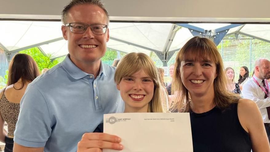 Lily Smith, 18, with her mum Julie and dad Justin, celebrating her four A* results