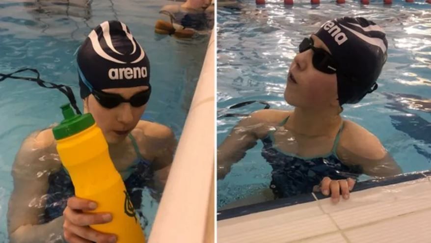 Twin sisters Scarlett and Eliza Humphrey in the water 