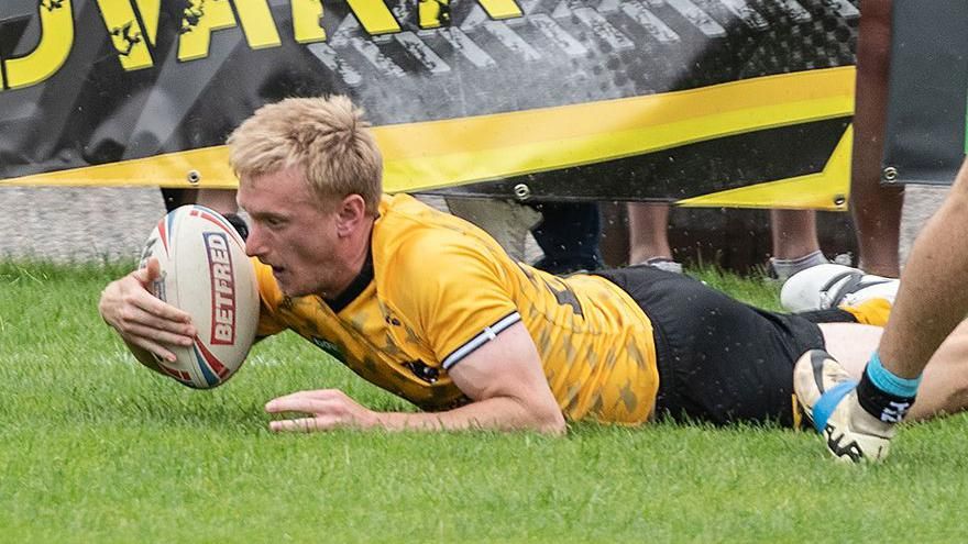 Callum Abbott scores a try for Cornwall