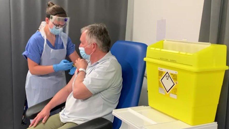 Prof Alex Brown gets a third dose of vaccine