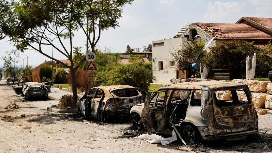 burned cars in kibbutz Beeri after 7 October attacks