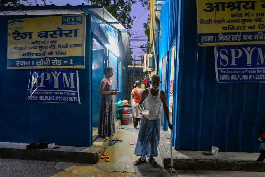 Homeless people seen staying inside a night shelter amid extreme hot weather conditions at Lodhi Road on June 18, 2024 in New Delhi,