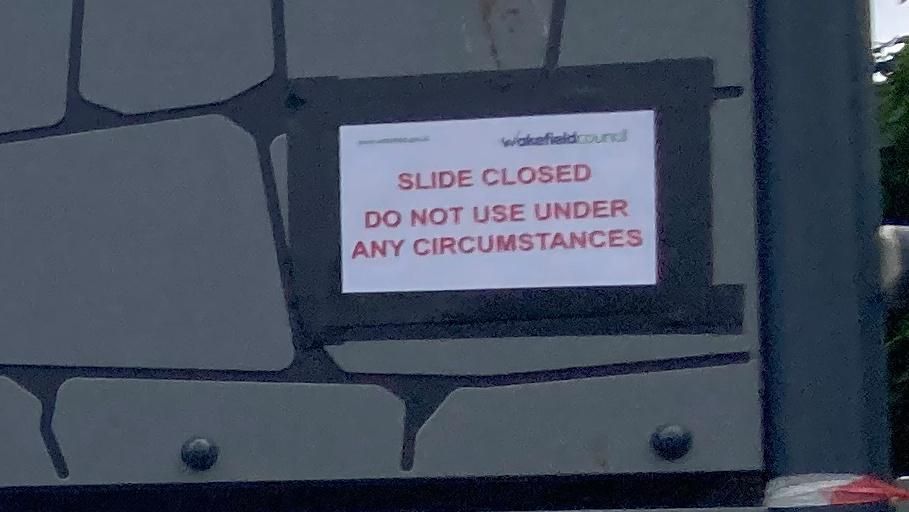 Warning notice on slide
