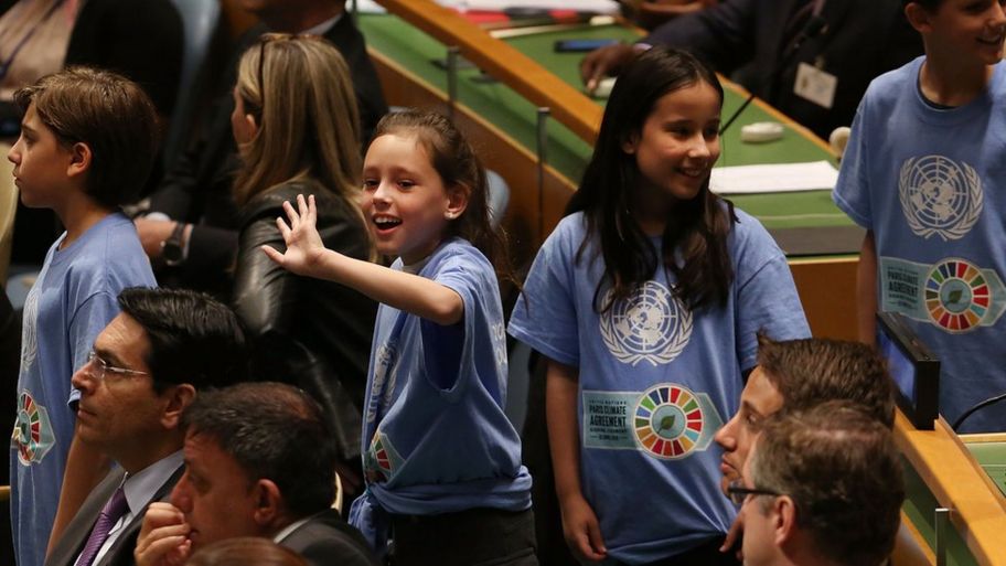Children at the signing ceremony for the Paris Agreement.