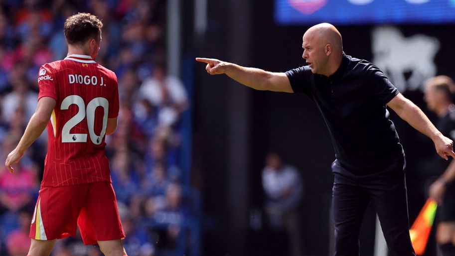 Liverpool boss Arne Slot gives instructions to Diogo Jota during the 2-0 win at Ipswich Town.