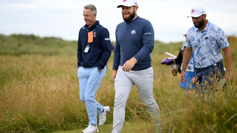 Luke Donald, Tyrrell Hatton and Jon Rahm during a practice round for the 152nd Open Championship at Royal Troon in July