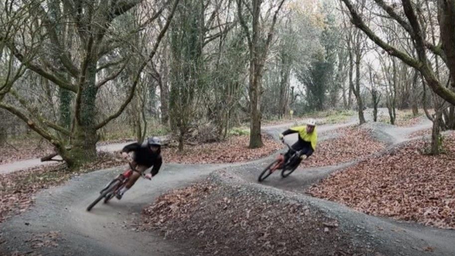 Two cyclists at Burlish Bike Park