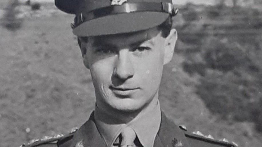 Black and white 1940s photo of Major Bryan Hilton Jones, smartly dressed in military uniform