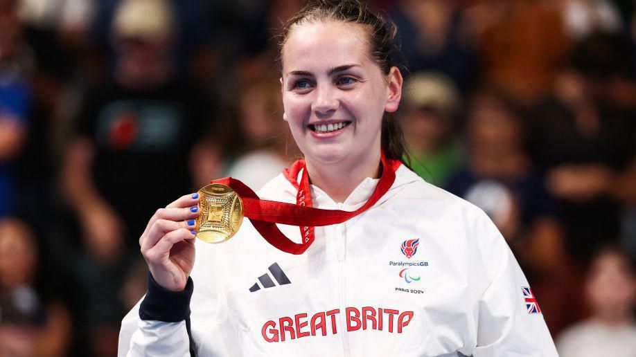 Tully Kearney poses with her gold medal