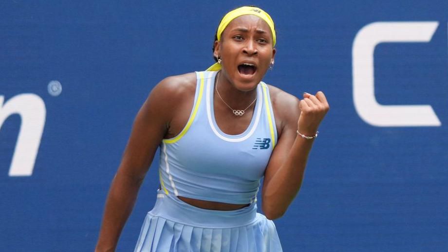 American Coco Gauff fist pumping in celebration