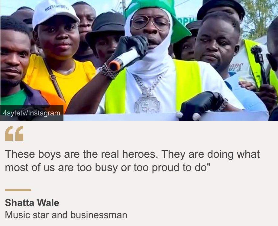 "These boys are the real heroes. They are doing what most of us are too busy or too proud to do"", Source: Shatta Wale, Source description: Music star and businessman, Image: Shatta Wale holding a microphone