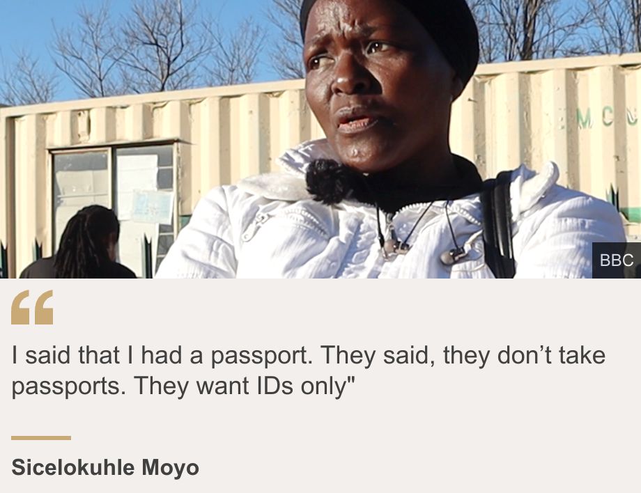 "I said that I had a passport. They said, they don’t take passports. They want IDs only"", Source: Sicelokuhle Moyo, Source description: , Image: A head and shoulders shot of a woman in a white jacket and black headwrap.