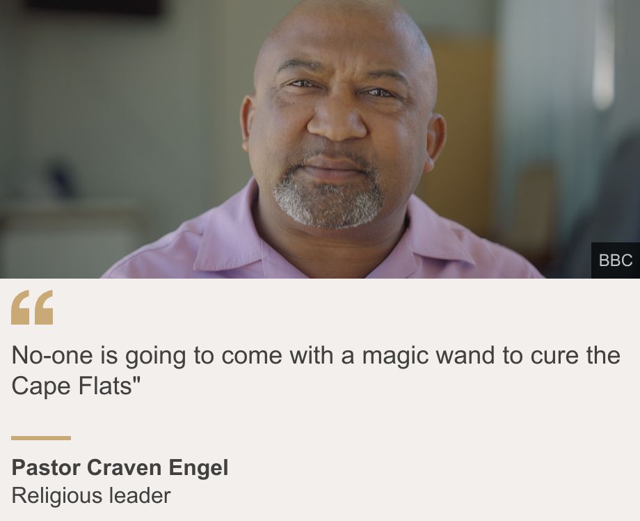 "No-one is going to come with a magic wand to cure the Cape Flats"", Source: Pastor Craven Engel , Source description: Religious leader, Image: A man in a pink short looking at the camera.