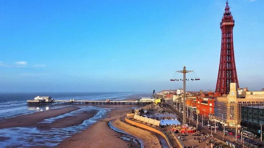 Aerial view of Blackpool showing the beach, pier and Blackpool Tower 