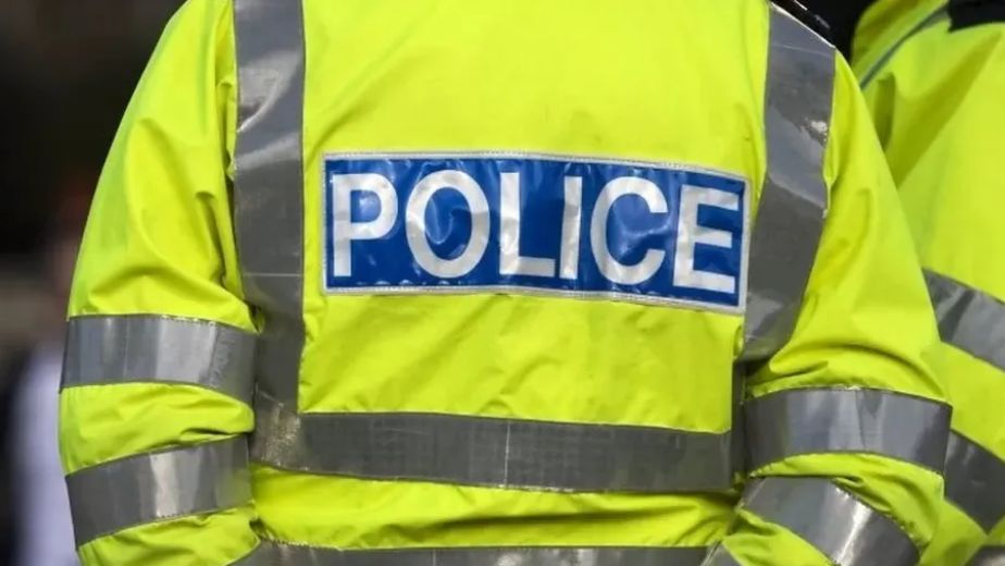 Appeal after shop worker robbed at knifepoint