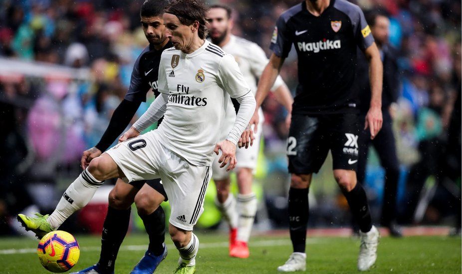Luka Modric in action against Seville