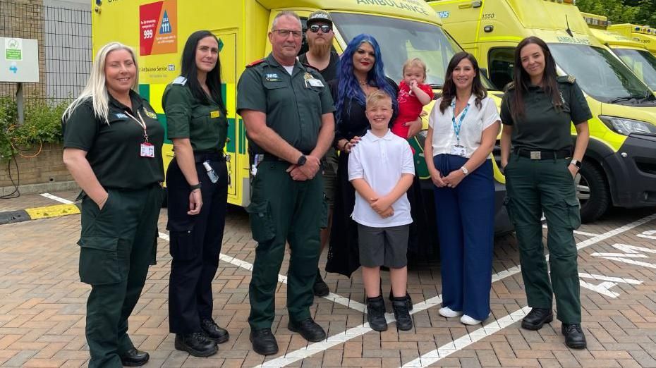 Sophie Turner (centre) and her children with Secamb crew