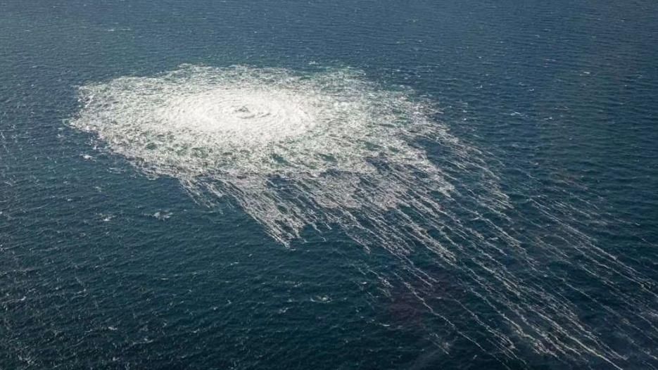 Bubbles are seen on the surface of the sea which is the gas leaking at Nord Stream 2 seen from the Danish F-16 interceptor on Bornholm, Denmark on September 27, 2022