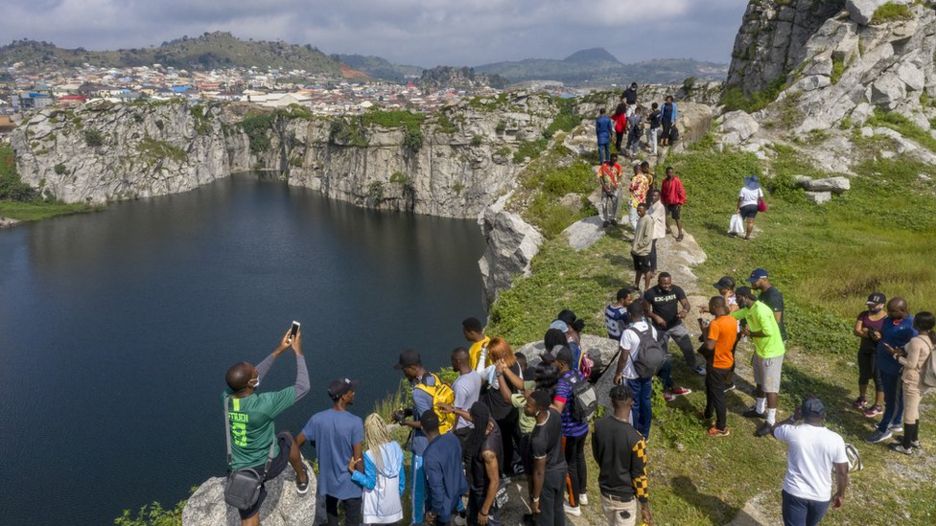 Tourists at Mpape Crushed Rock near Abuja, Nigeria