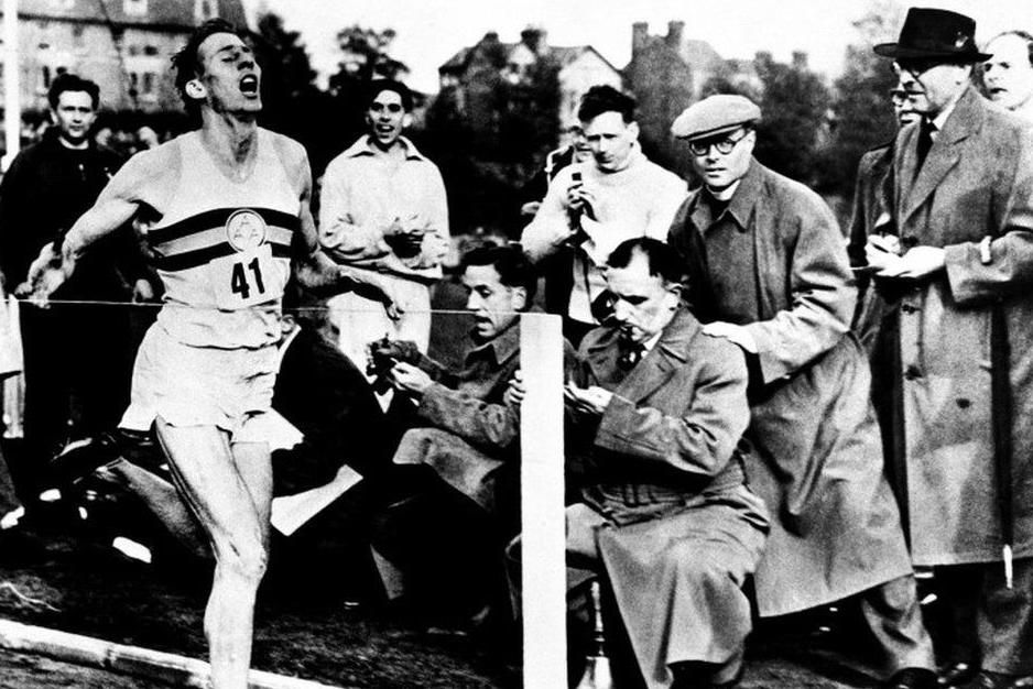 Roger Bannister running a mile in under four minutes