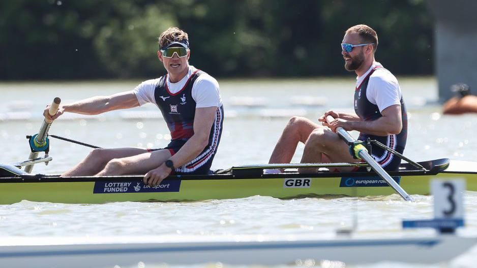 Tom George (left) and Ollie Wynne-Griffith sat in their rowing boat