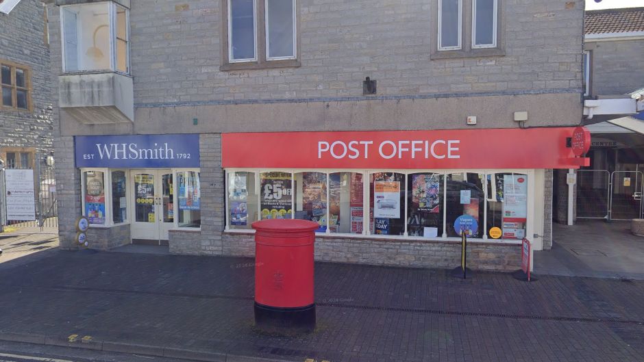 A screenshot of the street in Street with the WHSmith store and attached Post Office