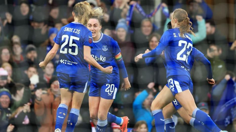 Everton players celebrate