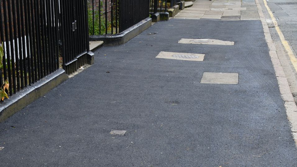 Pavements on Rodney Street covered with bitumen