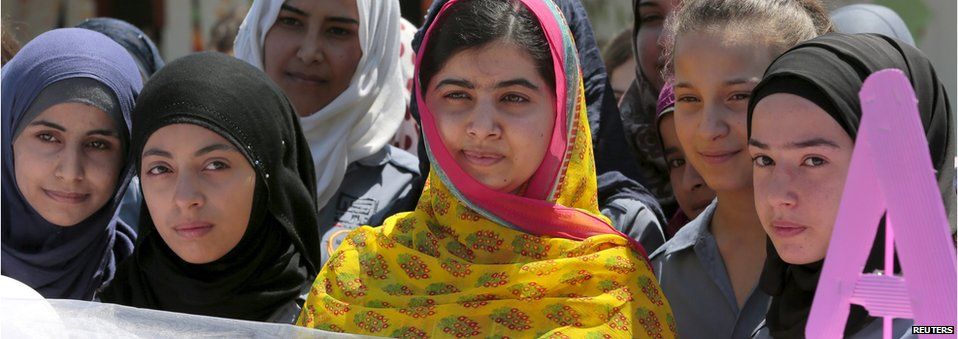 Nobel Peace Prize laureate Malala Yousafzai (C)
