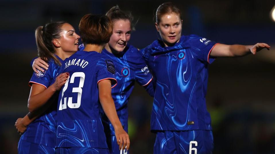 Johanna Rytting Kaneryd celebrating with team-mates.