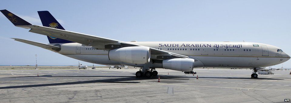 A Saudi Airlines plane sits on the tarmac at Nice airport in south eastern France on 26 July