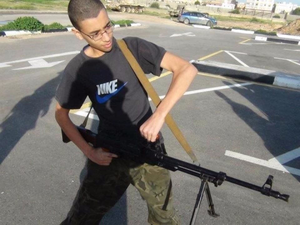 An image of Hashem Abedi from his father's Facebook page shows him brandishing a large gun