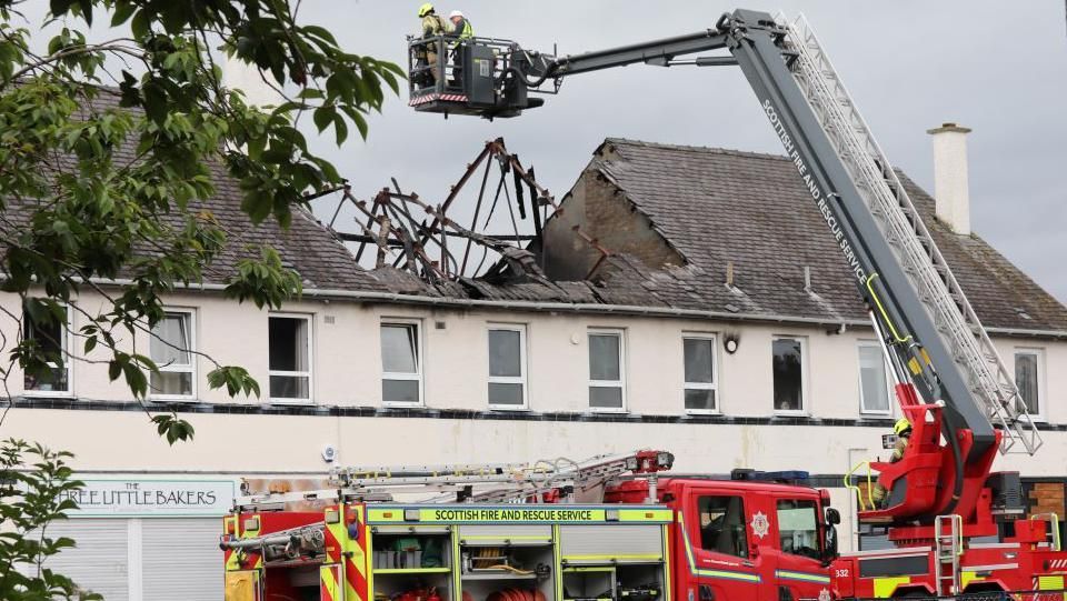 Firefighters at the site of the blaze in Inverness' Hilton area