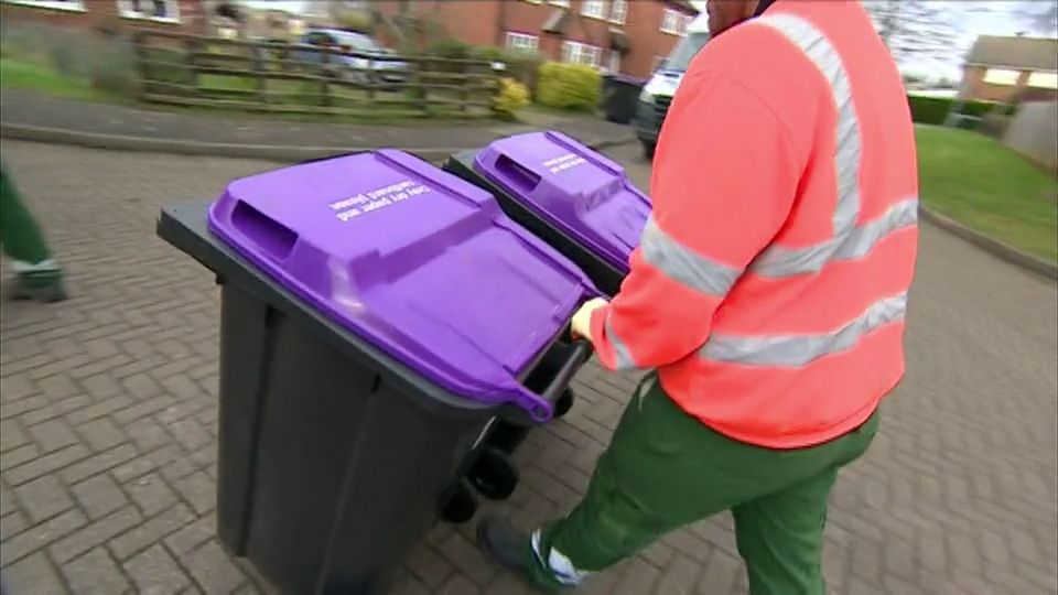 Purple bins being collected 