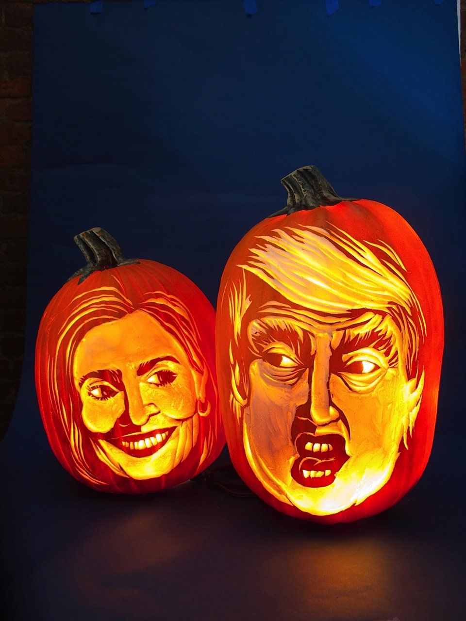 Hugh McMahon's pumpkin realisations of Hilary Clinton and Donald Trump
