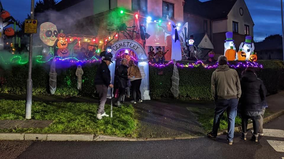 People queuing to see a Halloween house in Letchworth