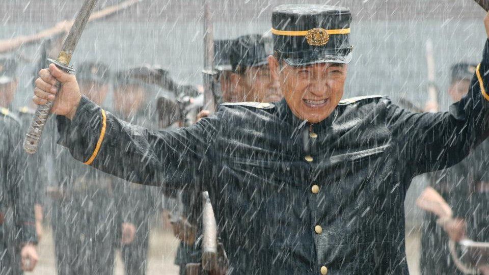 Actors on the set of North Korean director Pyo Hang's military film
