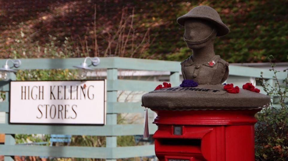 This knitted soldier at High Kelling in Norfolk is intended to represent all those who gave their lives during wartime. 