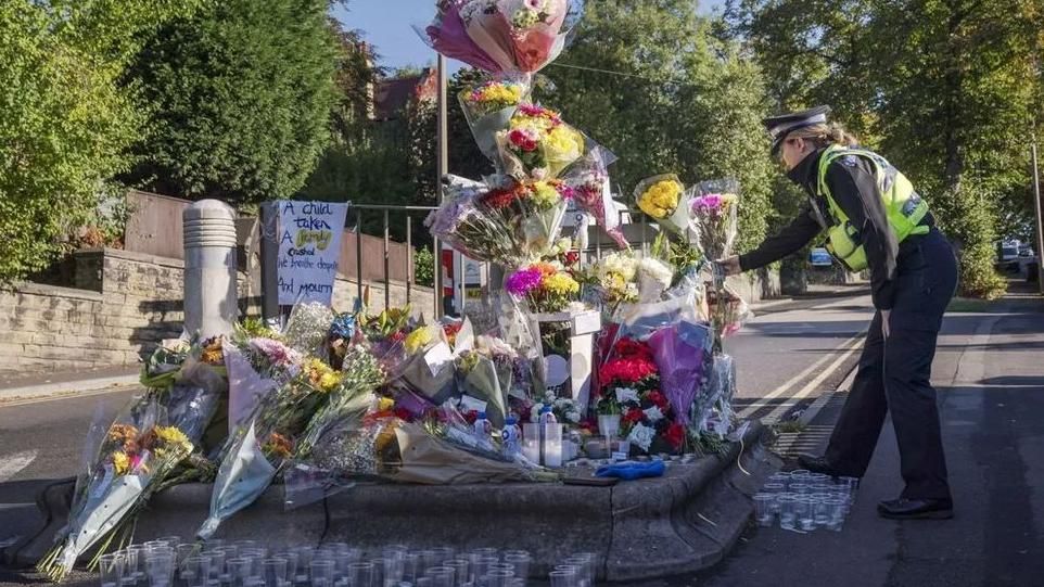 Flowers left outside North Huddersfield Trust School in 2022