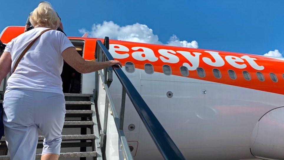Passenger getting on EasyJet plane