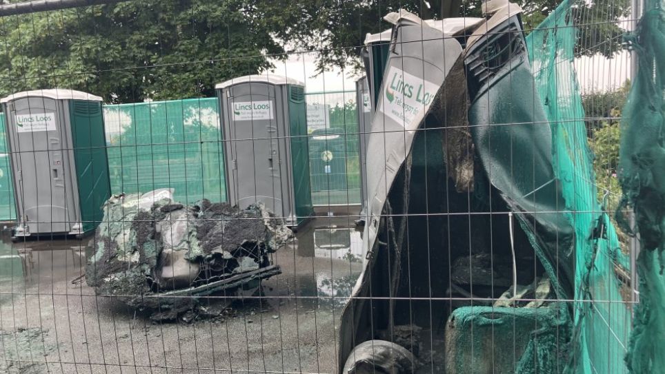 Fire damaged portable toilets in Cleethorpes