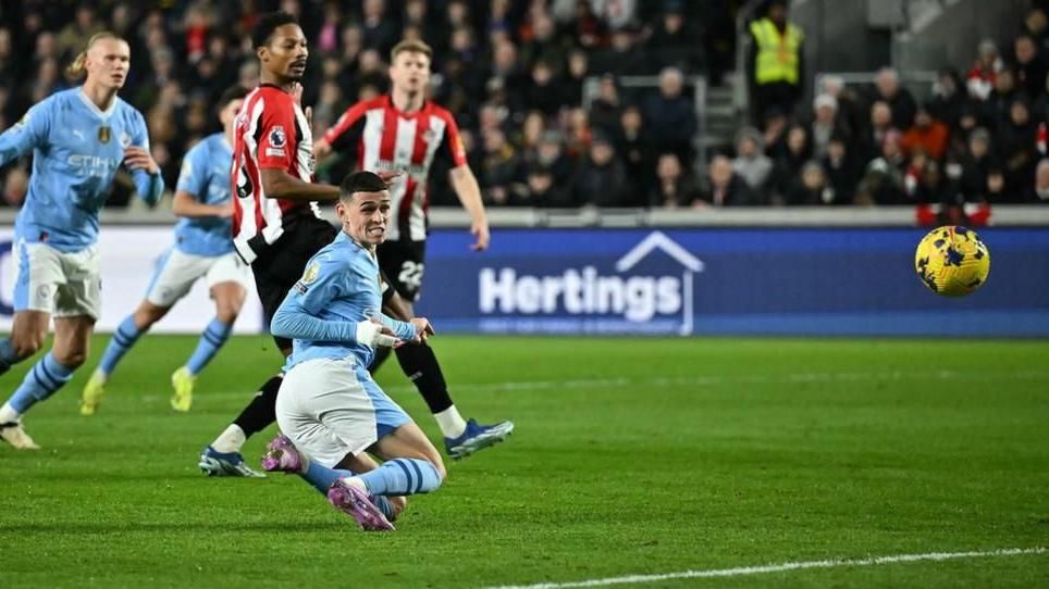 Phil Foden in action against Brentford, on the way to his second Premier League hat-trick