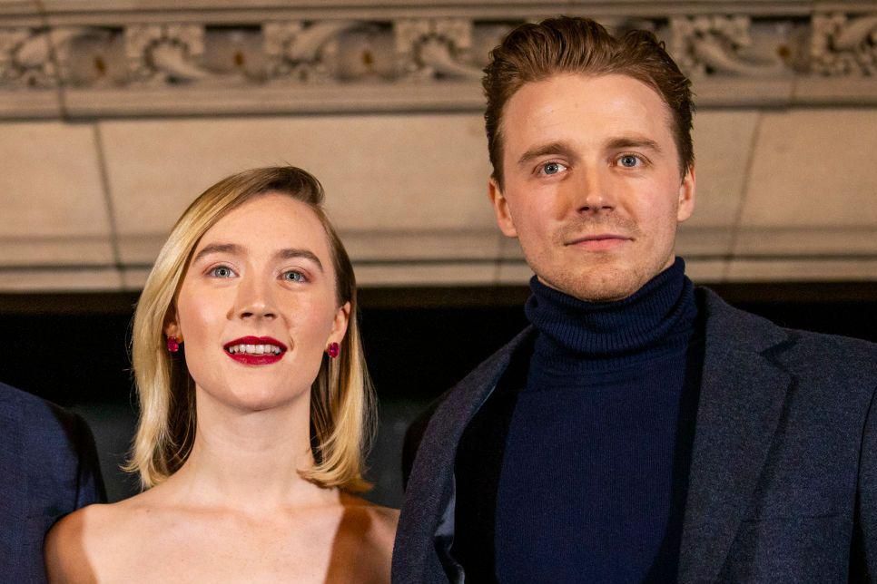 Saoirse and Jack Louden wearing lovely clothes at a film premiere