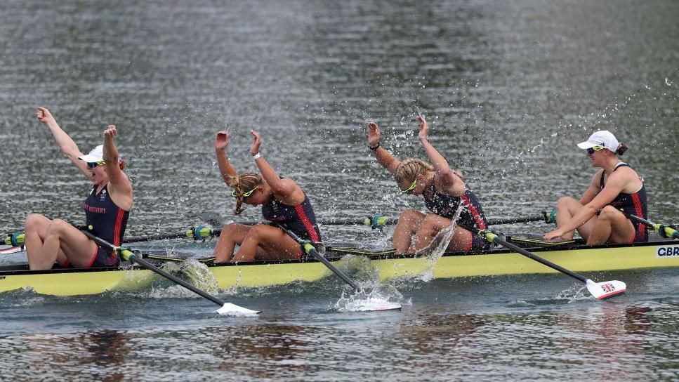 GB rowers celebrate winning gold in the women's quadruple sculls final