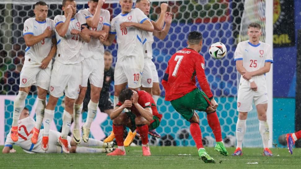 Cristiano Ronaldo takes a free-kick against Czech Republic