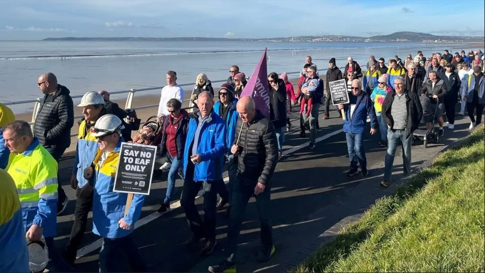 People walking with placards in Port Talbot